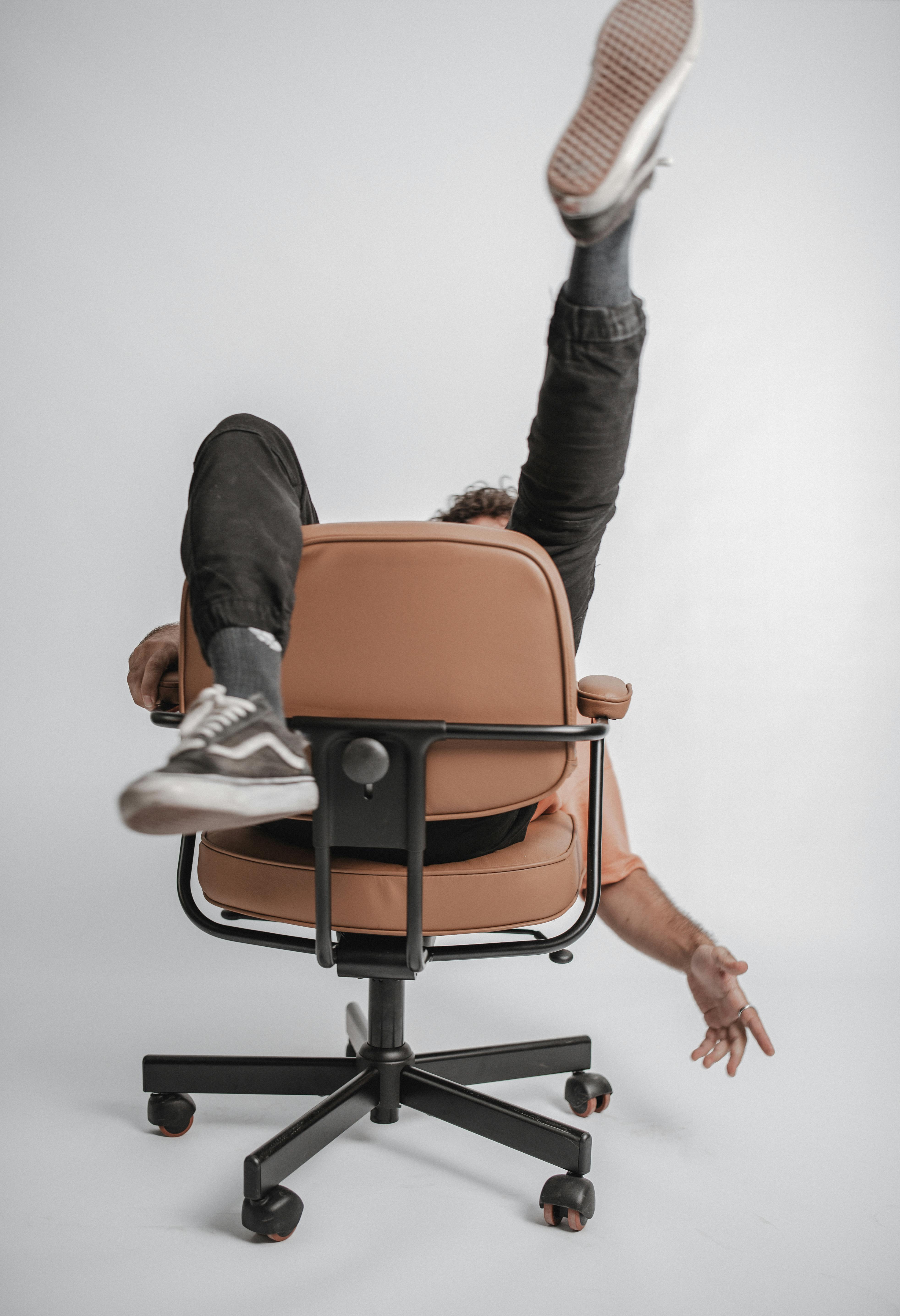 recording of scooting around the floor with an office chair (Vasilottos, Pexels, 2021)